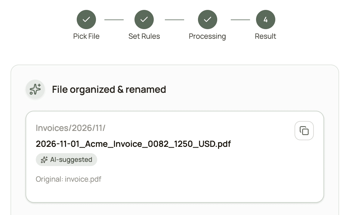 Renamed.to result showing an invoice renamed with date, vendor, and amount and the original filename